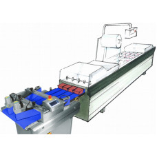 Package grouping and feeding conveyor